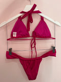 Top nudos magenta satinado