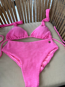 Top nudos rosa curl